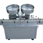 Capsule counting and filling machine