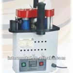 Hand held edge banding machine