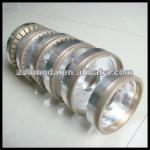 Diamond wheel for straight line single edger