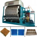 Reciprocating egg trays machine