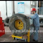 Scrap tyre cutter machine in the rubber production line at normal temperature.